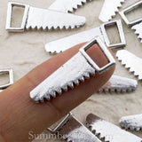 Tibetan Silver Hand Saw Charm Pendant